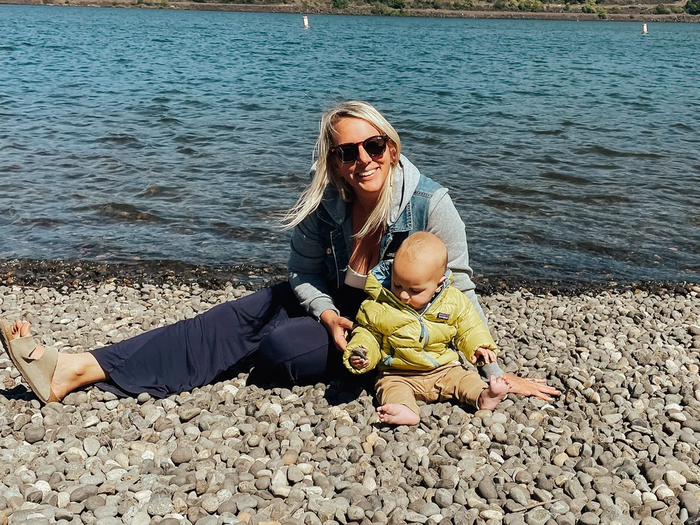 Kennady Scott by the river with her son